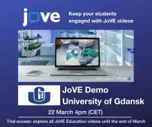 Otwarty laptop na tle laboratorium i powyżej logo JoVe