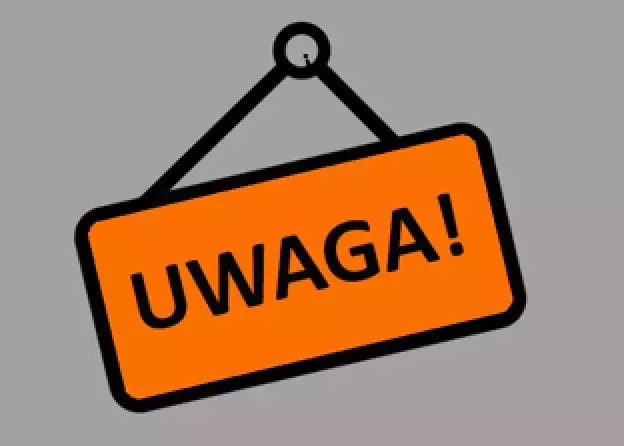 Na szarym tle pomarańczowa tabliczka z napisem; uwaga! Grafika informująca o przerwie technicznej w BUG 